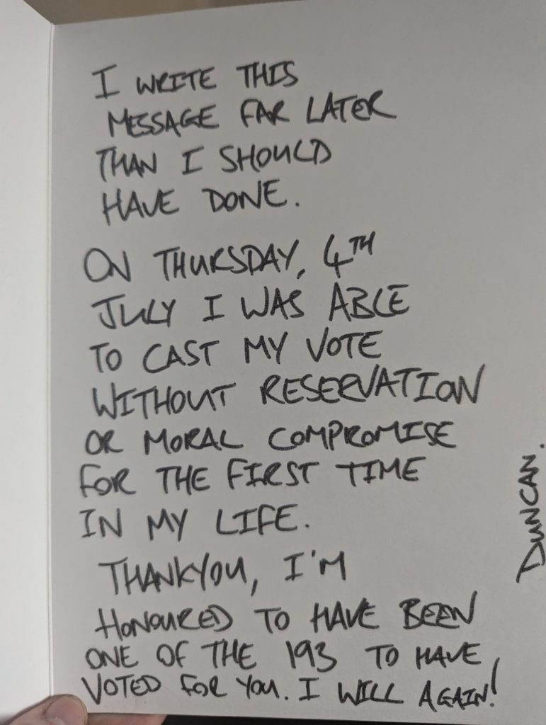 A card received by the political party, the text of which is in the article.